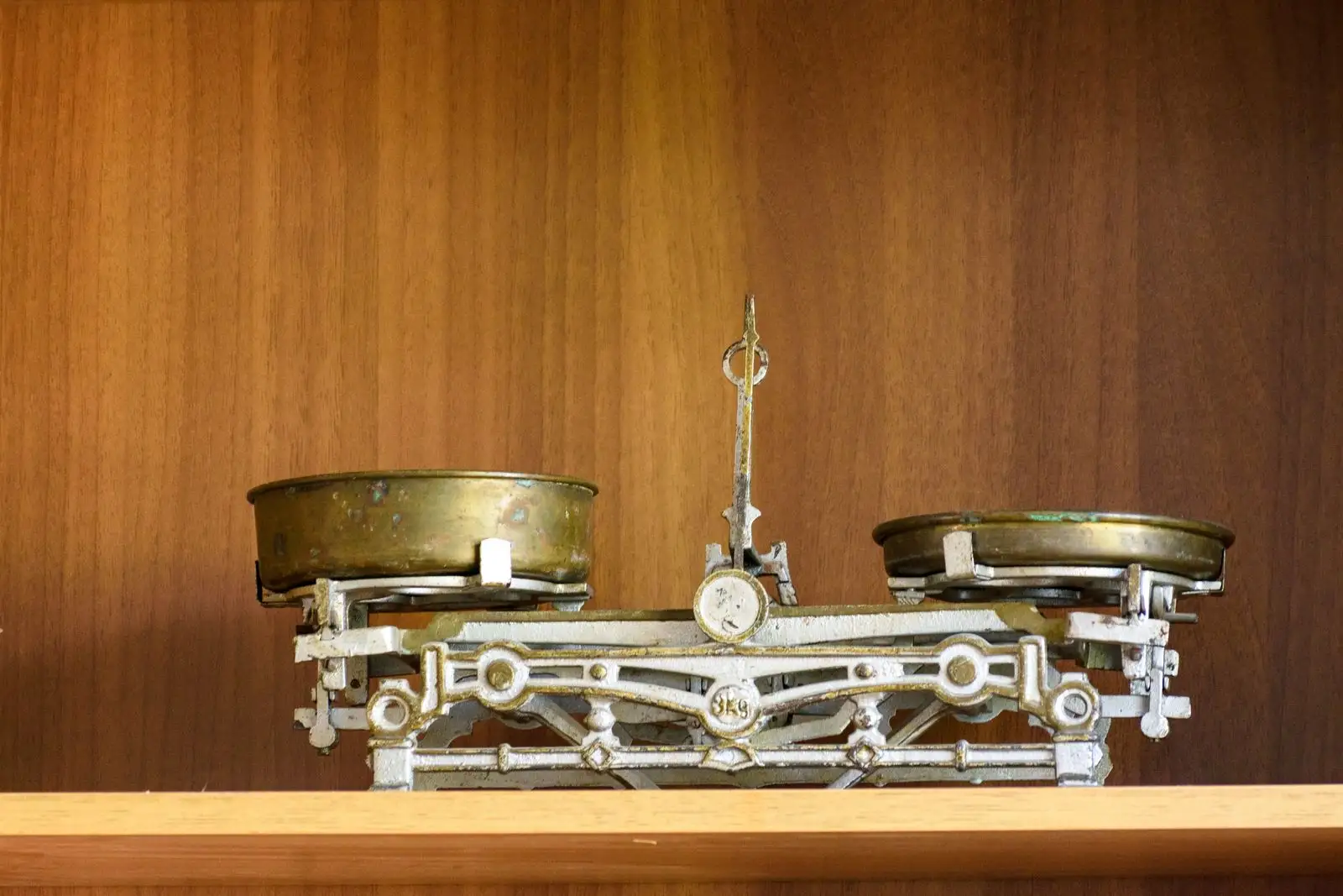 Brass two-pan balance scale symbolizing fairness